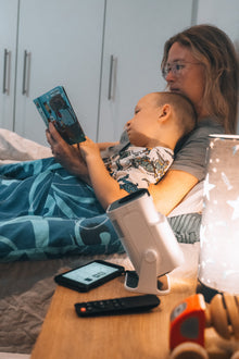 Family using the Ozmotic Learning projector